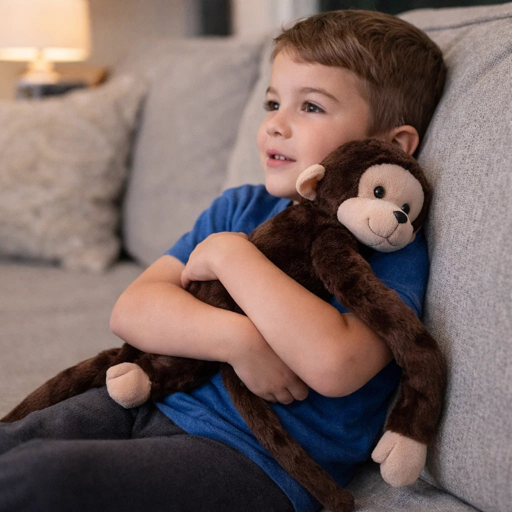 Monito Abrazo Mágico™ – El peluche que acompaña, calma y reconforta a tu hijo
